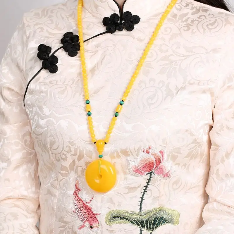 Beeswax peace , chicken oil yellow old , freeform amber chain, fish eye pendant, women's round bead sweater