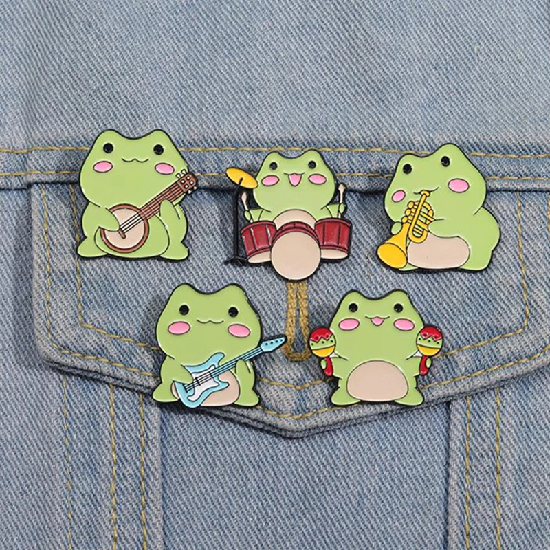 The Frogs Band Enamel Pins Custom Drum Kit Frog Playing Guitar Brooches Lapel Badges Animal Jewelry Gift for Kids Friends