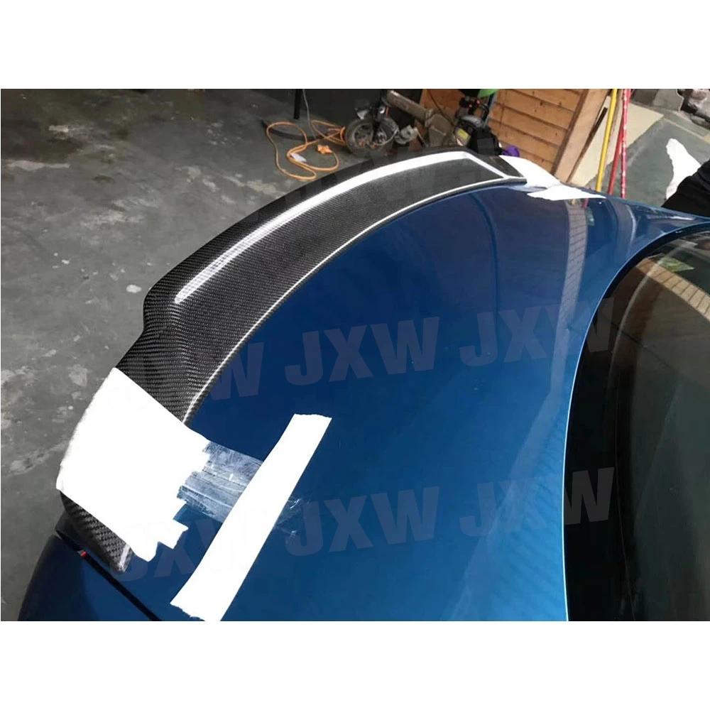 

Комплект карбоновых элементов JXWANCF: передний сплиттер, боковые юбки, задний диффузор, задний спойлер, накладки на бампер и решетку радиатора для BMW F87 M2 2015-2018