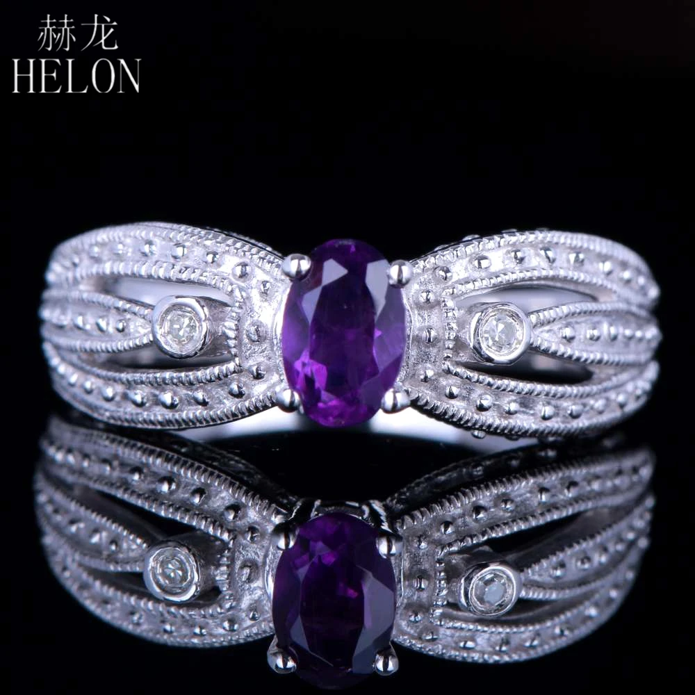 

Женское кольцо из белого золота, 6 х4 мм, с натуральным аметистом