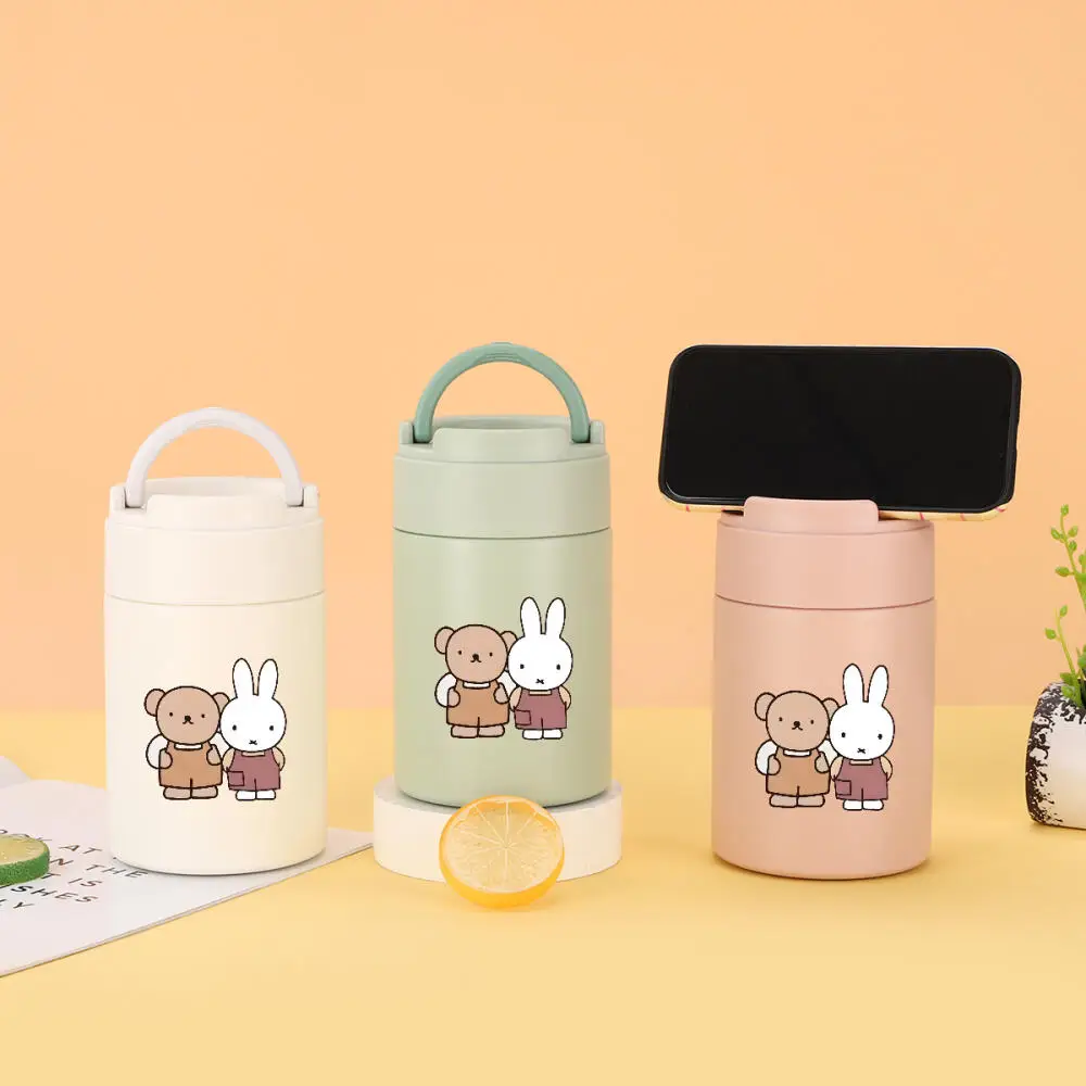 

Miffy Rabbit Cute Cartoon with A High Level of Appearance A Phone Stand Carry A Spoon and Hold A Heat Retaining Vacuum Cup