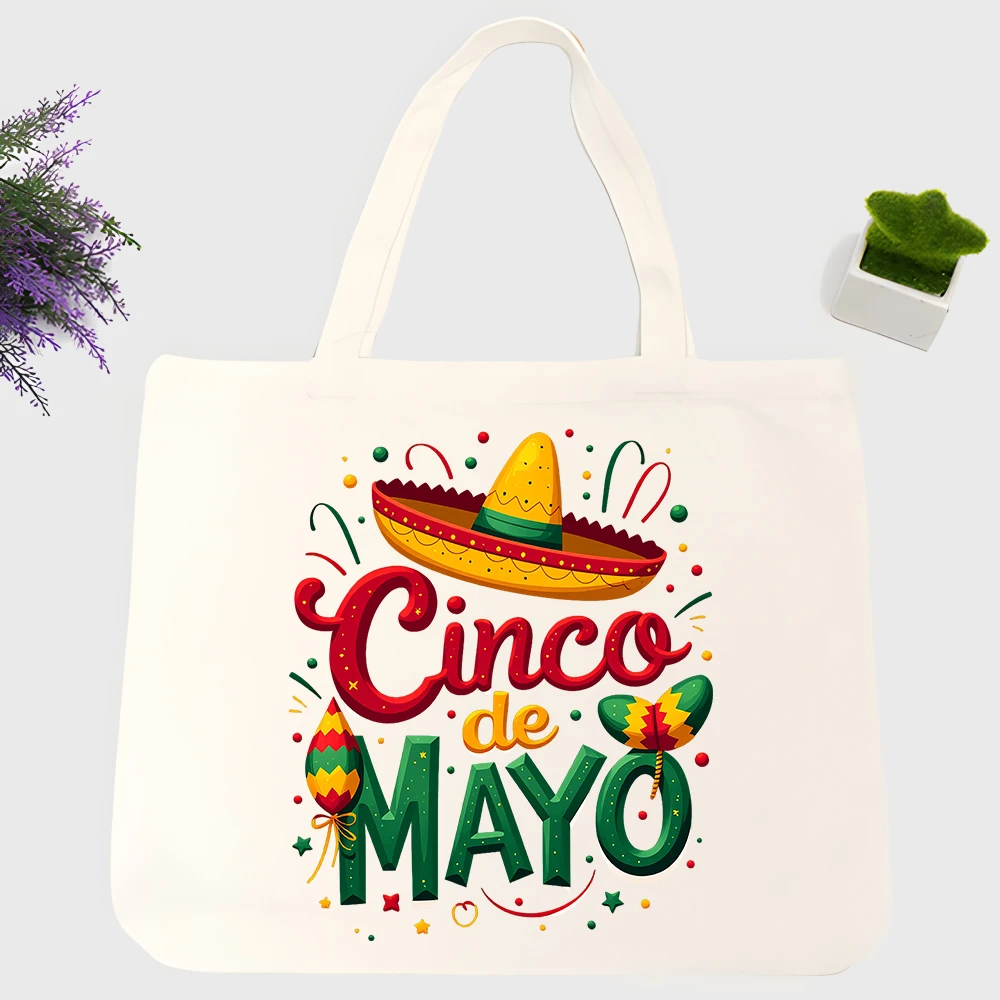 Women's Cinco de Mayo graphic canvas tote bag with sombrero print, perfect for casual summer outings and holiday celebrations