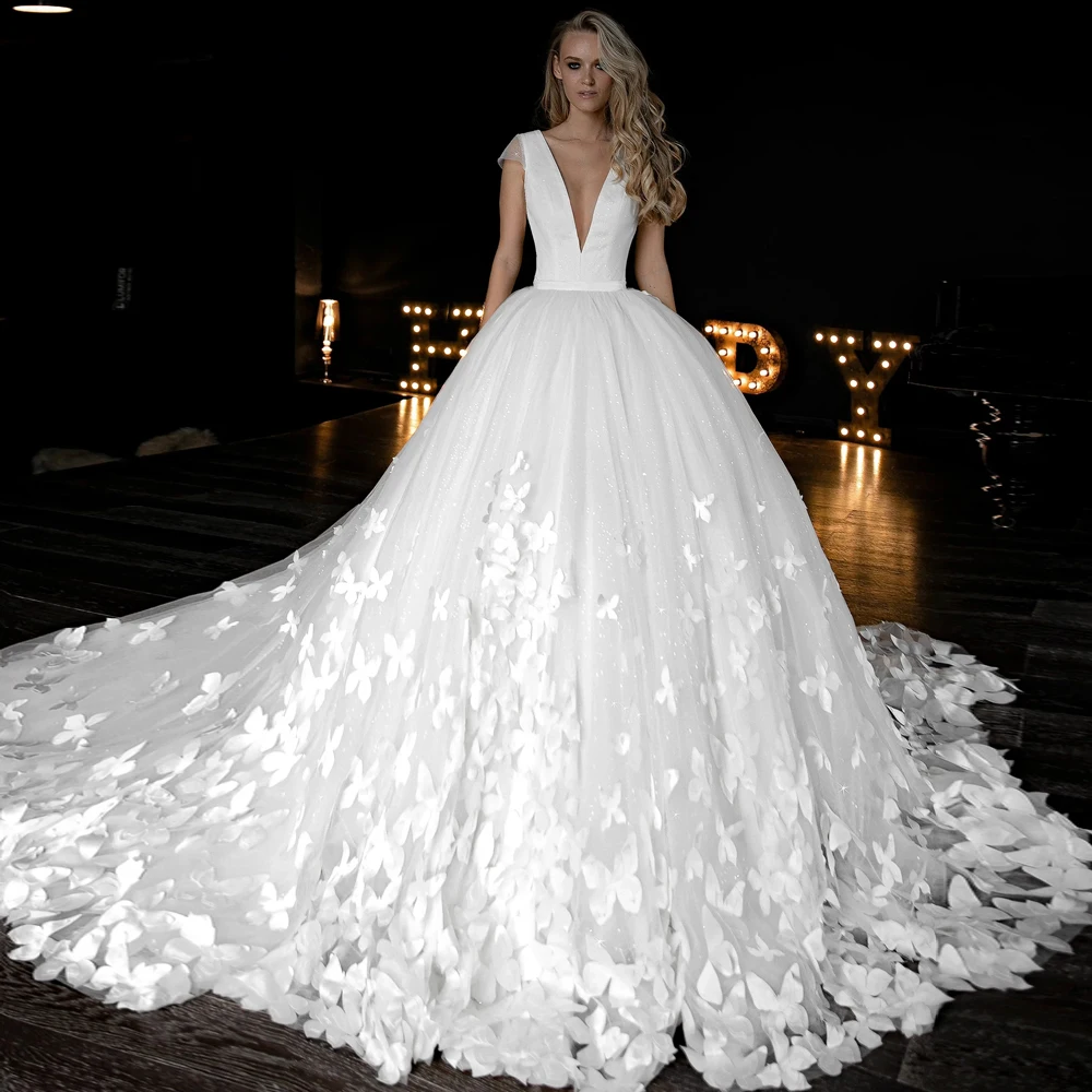 

Lceland Poppy Customized Deep V Neck Ball Gown Tulle Wedding Dresses Cap Sleeves Glitter Bridal Gowns with Chapel Train