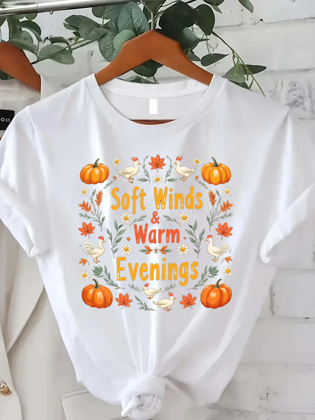 

Удобная женская футболка с принтом, осенняя мягкая ветровка и теплая вечерняя футболка с тыквой и цветочным принтом
