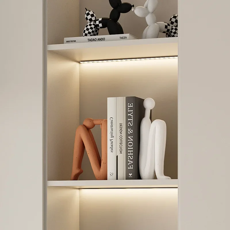 Modern light luxury creative character book file TV cabinet abstract ornament, high-end wine cabinet