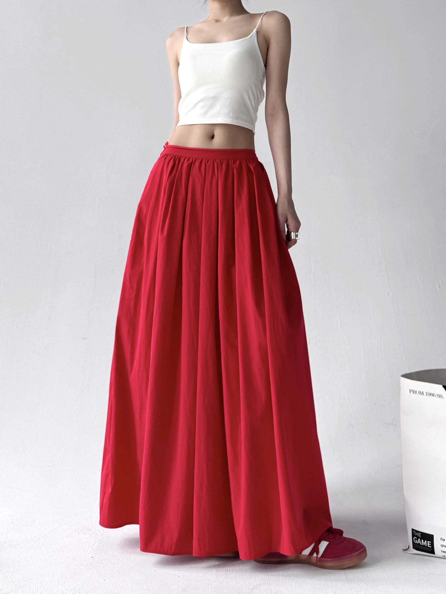 

Модная тонкая юбка-миди трапециевидной формы с высокой талией и эластичной резинкой на талии, женская летняя новинка 2025, повседневная однотонная утягивающая юбка