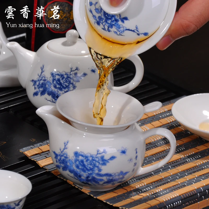 Kung fu tea set the whole kettle set of blue and white porcelain ceramic teapot solid wood tea tray tea ceremony