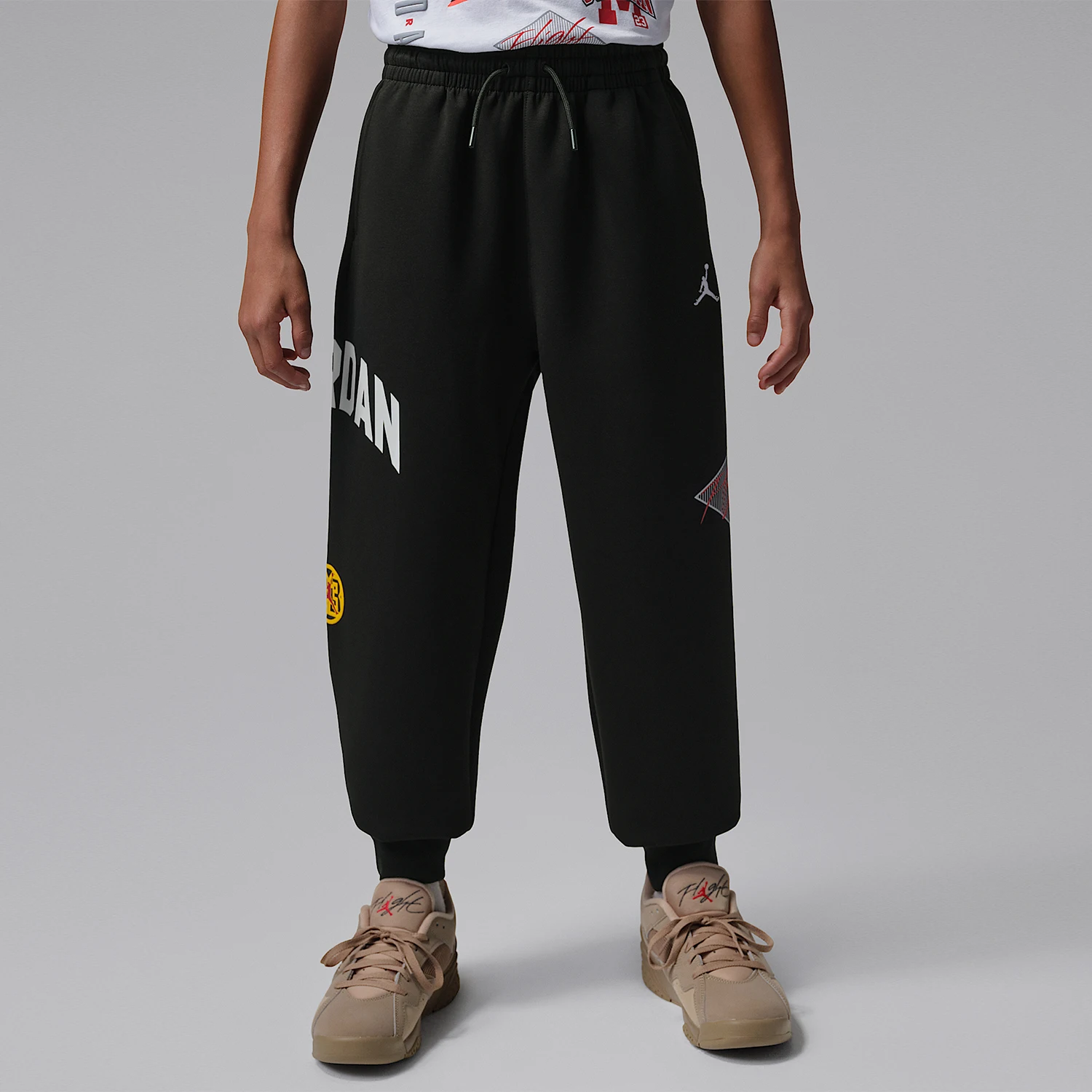 

Оригинальные детские трикотажные спортивные брюки Nike JORDAN с вышивкой и завязками IU5389-010