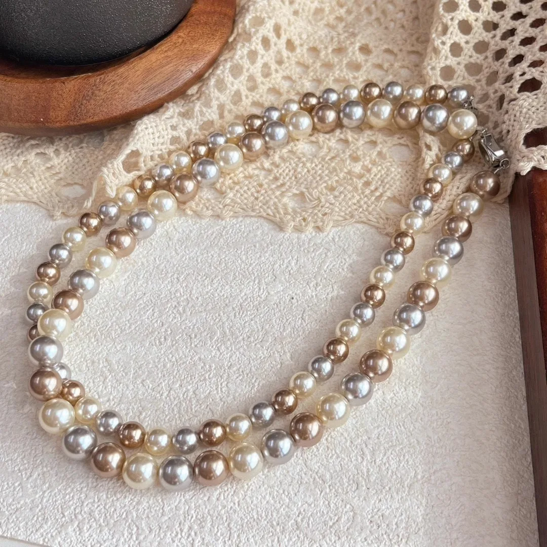 

Light Maillard style, high-quality imported craftsmanship Shijia pearl mixed coffee pearl necklace female niche