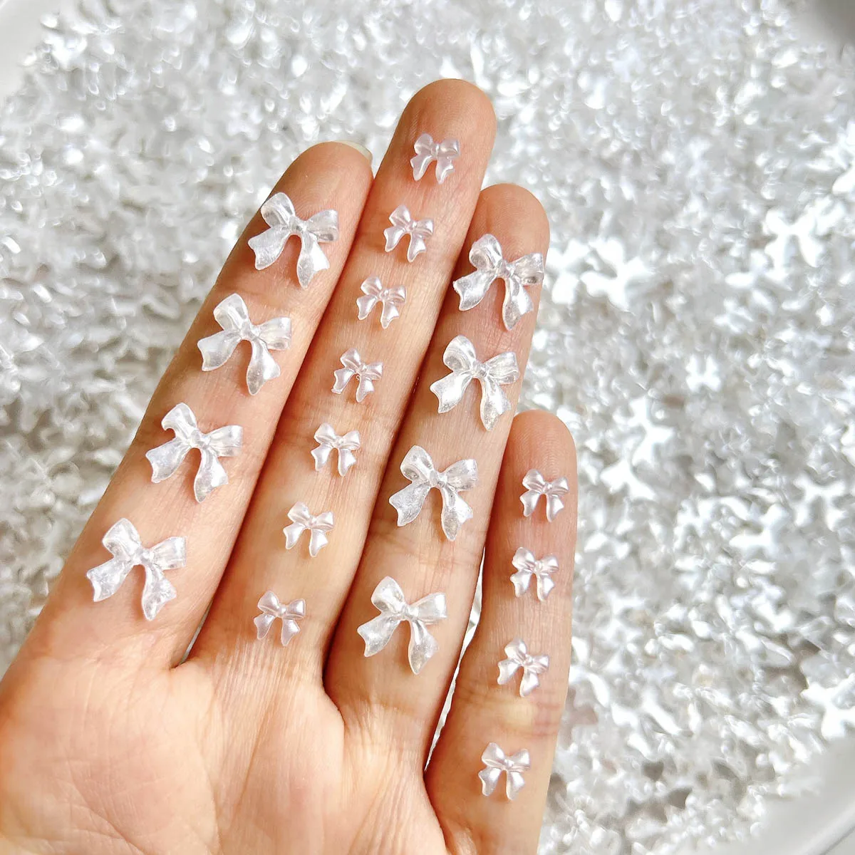 

50PCS 3D Minimalist Sweet Bows Resin Nail Charms Classic Pearlescent White Ribbon Bowknots Nail Art Decorations for DIY Nails