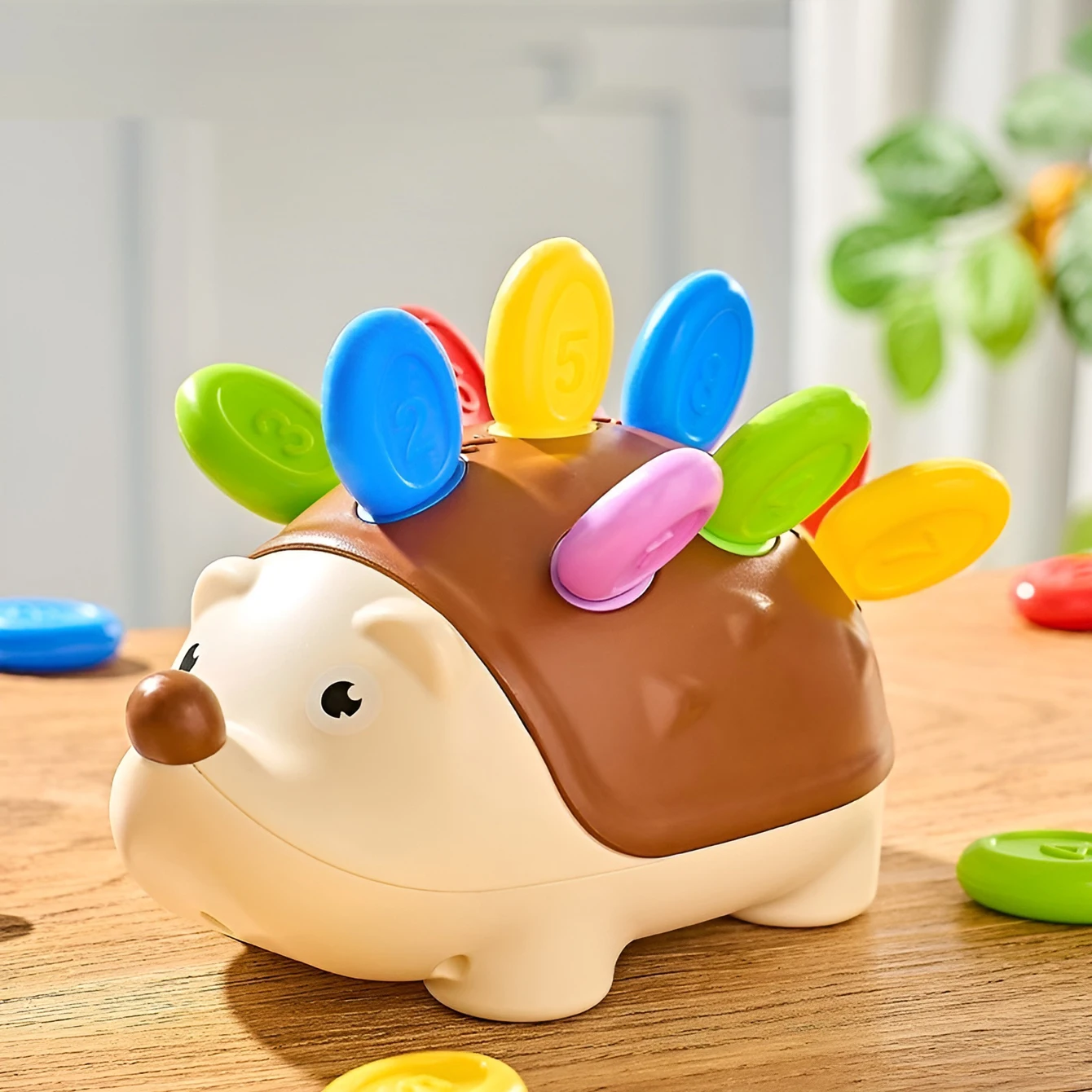 Children's educational puzzle toy featuring stuffed hedgehog, with number matching and assembly features