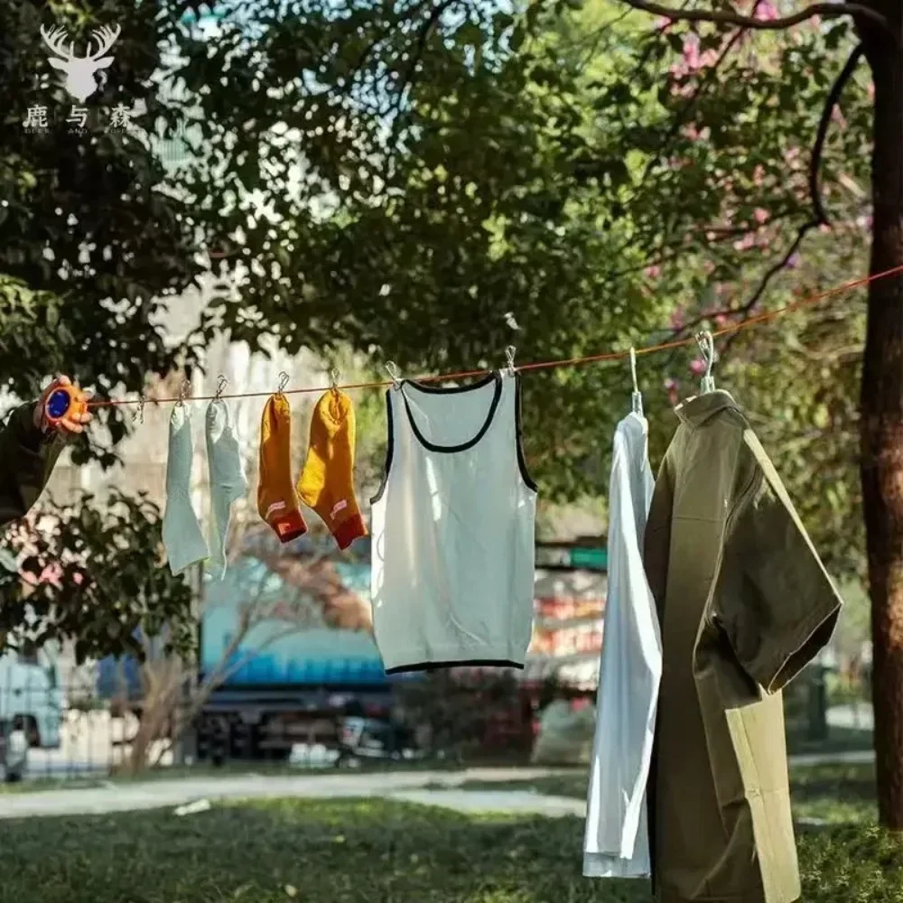 1 Stück tragbare, einziehbare Wäscheleine für den Außenbereich, ideal für Reisen, Camping und Hotels, winddicht, rutschfest, 10 m, Wäscheaufhänger, Trocknungsseil, Zubehör. – Detail 2