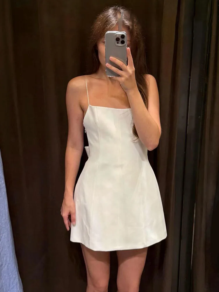 HH mujer nueva moda lazo trasero decoración cremallera sólido Sling vestido verano mujeres Sexy sin mangas espalda descubierta fiesta Mini vestido