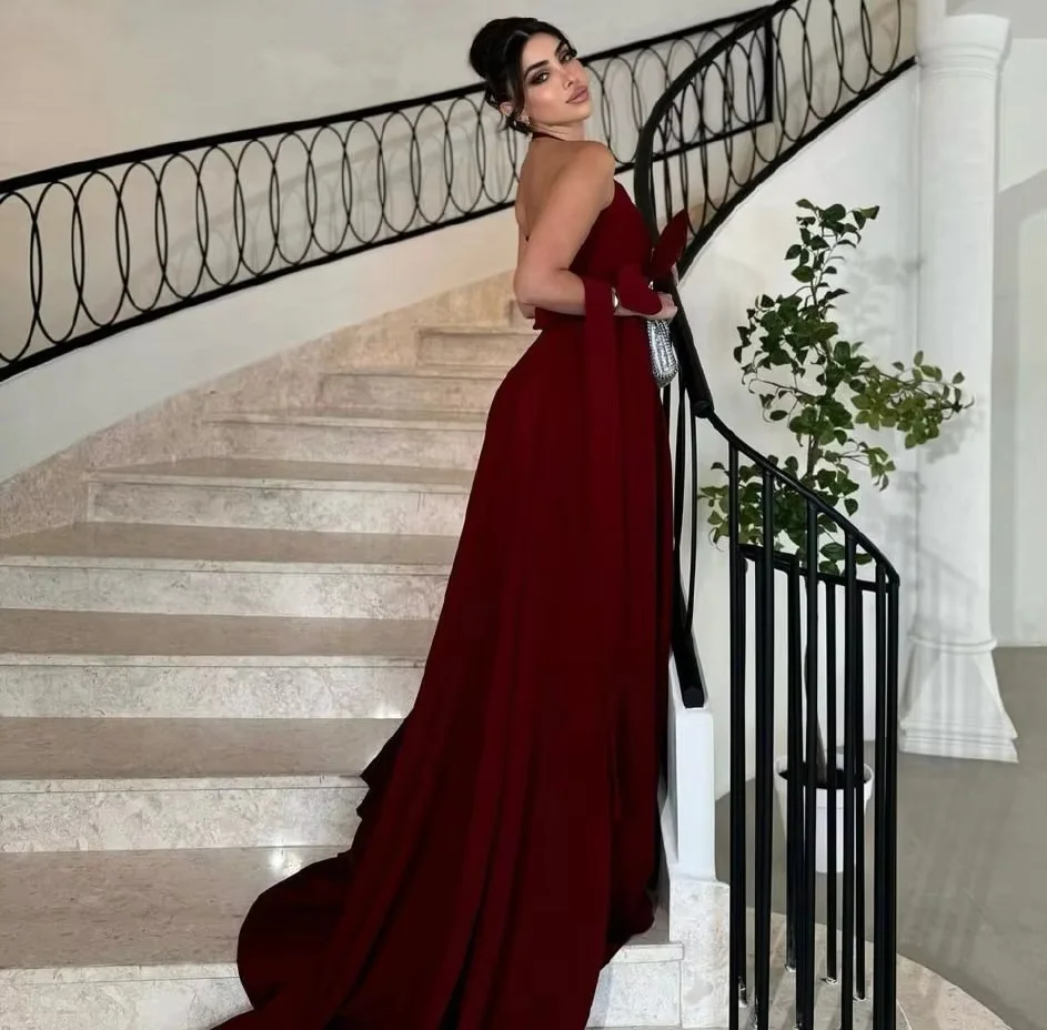 Halter long evening dress with bow waist detail, flowing mermaid skirt, figure‑hugging cut. Custom‑made & multi‑colors available