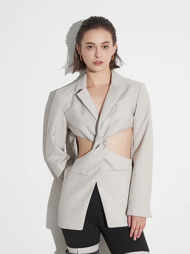 TWOTWINSTYLE Solid Hollow Out Twist Front Blazers For Women Notched Colar Long Sleeve Spliced Pockets Chic Blazer Female Fashion