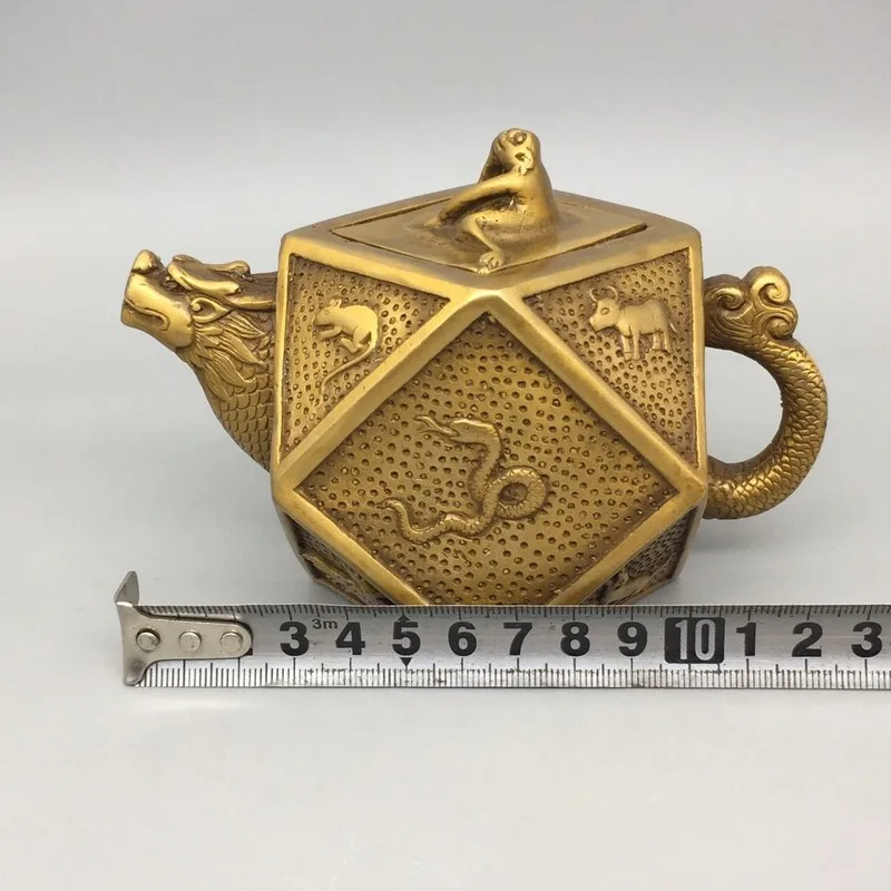 Brass zodiac animal figurines, including a wine pot a teapot, for home decoration and as decorative crafts