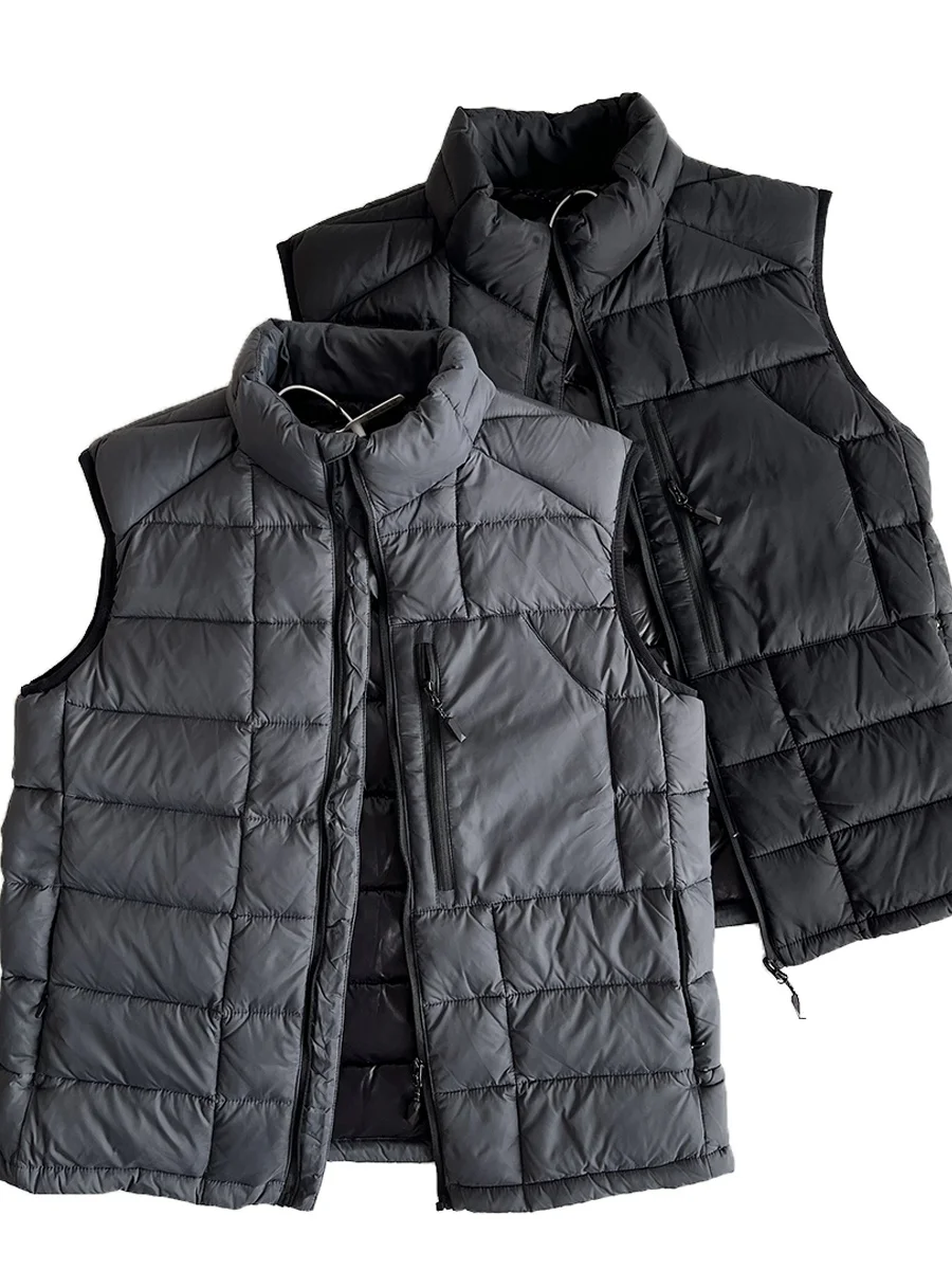 

Пуховый жилет из 90% белого пуха с воротником-стойкой, теплосберегающий, без подкладки, без внешнего слоя, из полиэфирного волокна, на молнии