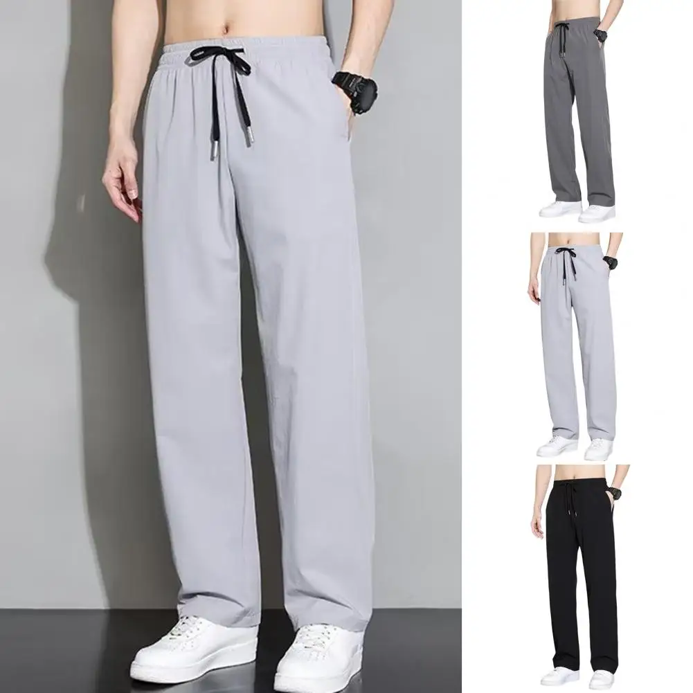 

Men Trousers Quick-drying Men's Gym Traning Sweatpants Elastic Waist Side Pockets Ice Silk Fabric Loose Fit Jogging Trousers