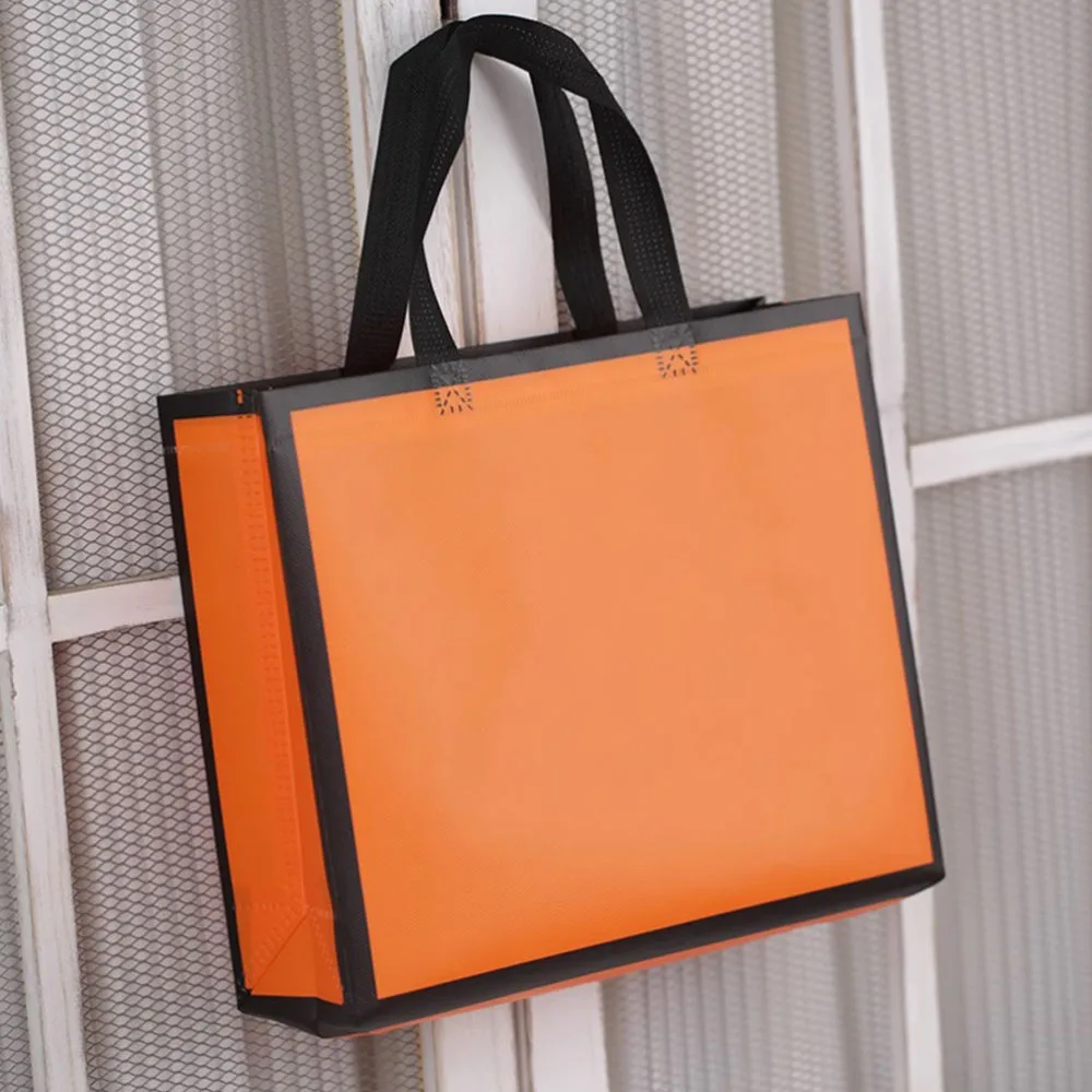 

32X27X10CM 10 Pcs Blank Logo Orange Black Edge Non Woven Fabric Store Handbag