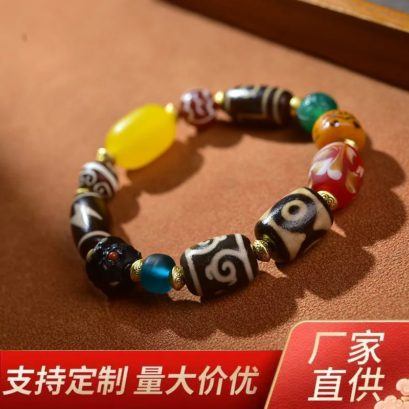 Tibetan-style multi-bead bracelet three- paired with Tara and five-eyed beads,