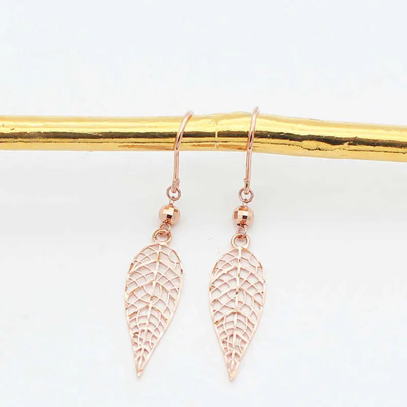 585 purple gold plated 14K rose gold hollow-out leaf earrings for women new in light luxury high-level ear hook party jewelry