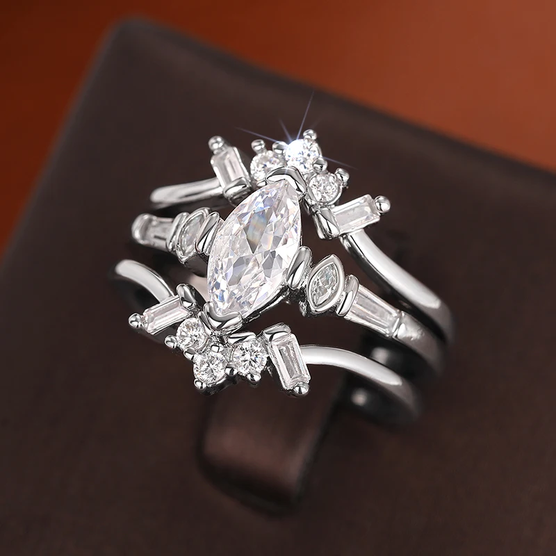 Huitan Dazzling 3Pcs Set Marquise-förmigen Zirkonia Weibliche Ringe Hochzeit Band Schmuck Abnehmbare Tragen Frauen Zubehör