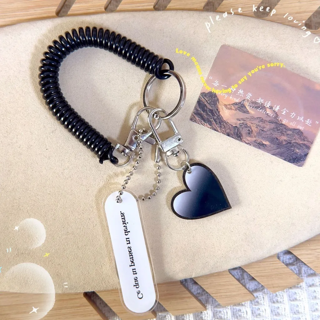 البلاستيك شنقا تمتد البلاستيك الربيع مطاطا حبل الصيد اسهم مع حلقة تسلق القوارب الحبال مكافحة خسر الهاتف المفاتيح قفل