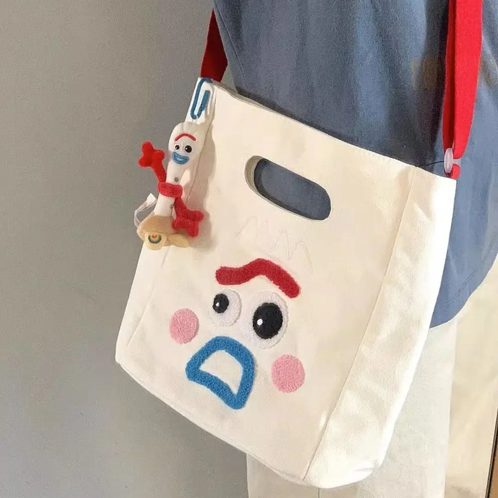 

High-Capacity Strange Expression Canvas Bags with Handle Magnetic Buckle Closure Women's Handbag Zipper Inner Pocket