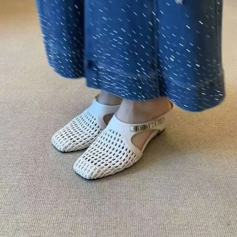 Pantuflas tejidas de cuero transpirable para mujer, zapatos informales de un solo paso, diseño de zapatilla versátil, suela de goma cómoda