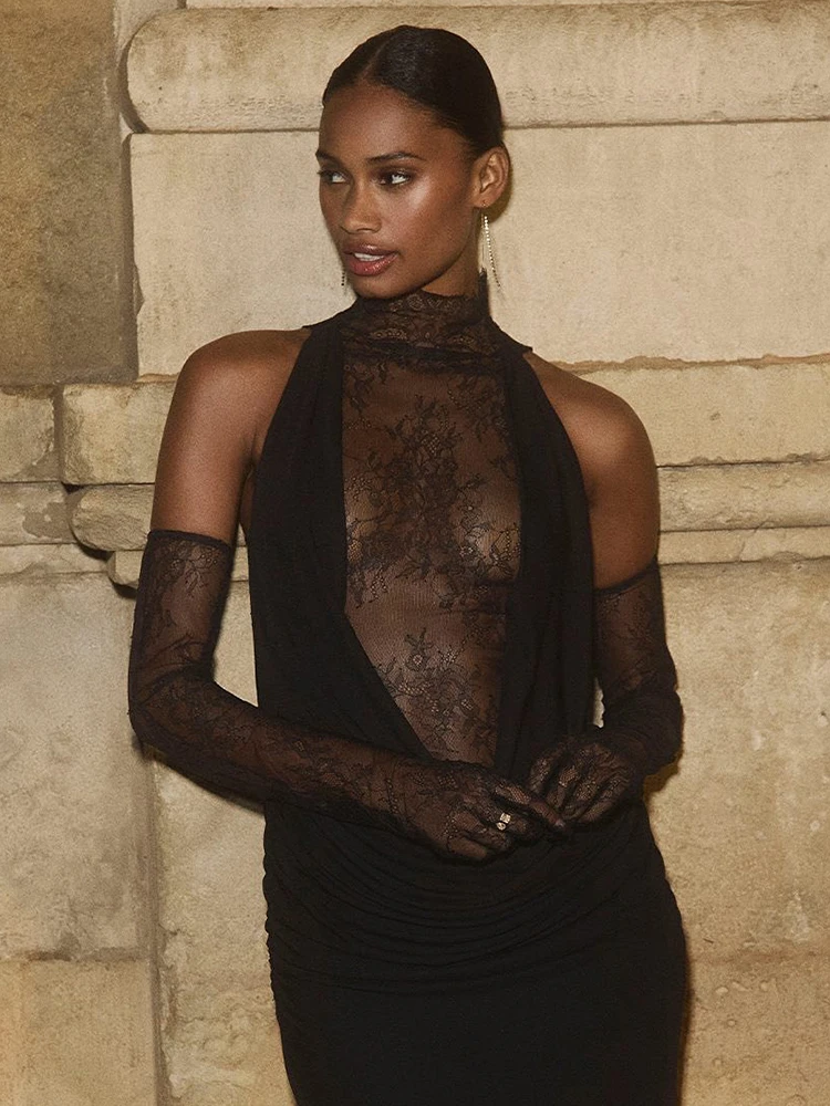 Elegante abito lungo con pieghe patchwork in pizzo nero con corpetto trasparente e guanti lunghi in pizzo Abiti da sera senza maniche senza schienale