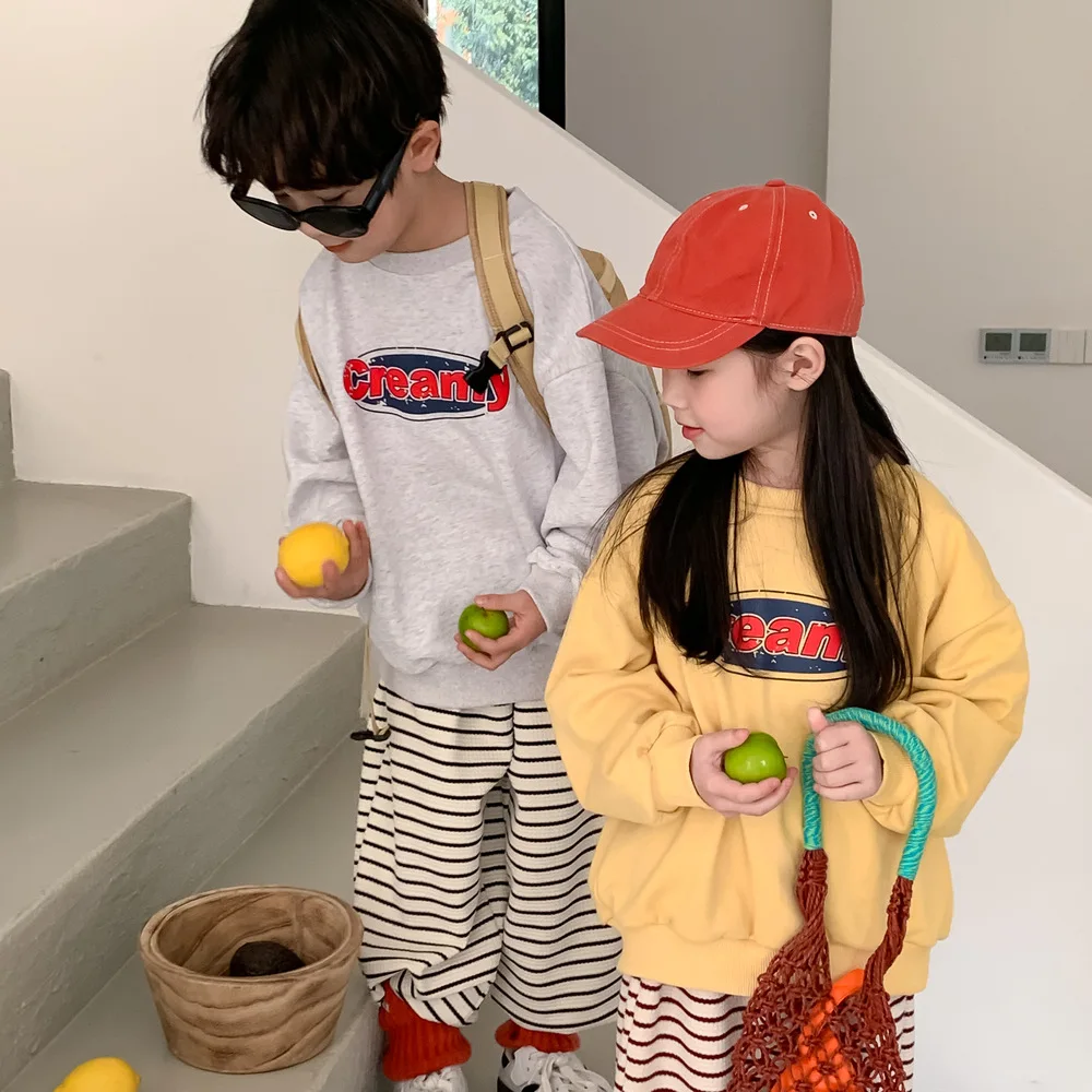 Felpa con cappuccio per bambini 2024 primavera stile coreano lettera stampata ragazzi e ragazze Casual girocollo manica lunga Casual allentato Top