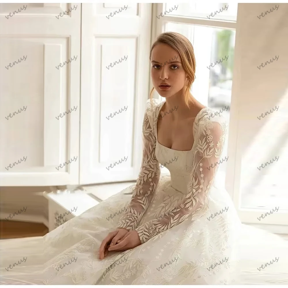 ゴージャスなウェディングドレス グラマラスなブライダルドレス レースアップリケ フルスリーブ スクエアカラー 魅力的な Vestidos De Novia カスタマイズ