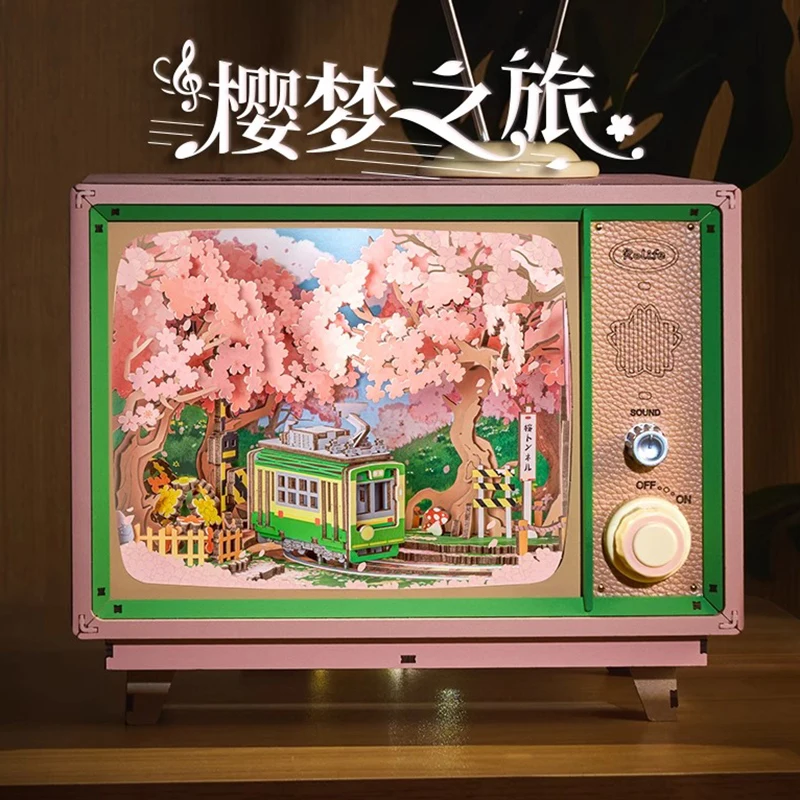 Robotime Rolife لتقوم بها بنفسك صندوق تشغيل الموسيقى ساكورا حالمة جولة ثلاثية الأبعاد لغز خشبي كتاب الزاوية التلفزيون أطقم منمذجة ديكور المنزل هدية عيد ميلاد عيد الميلاد