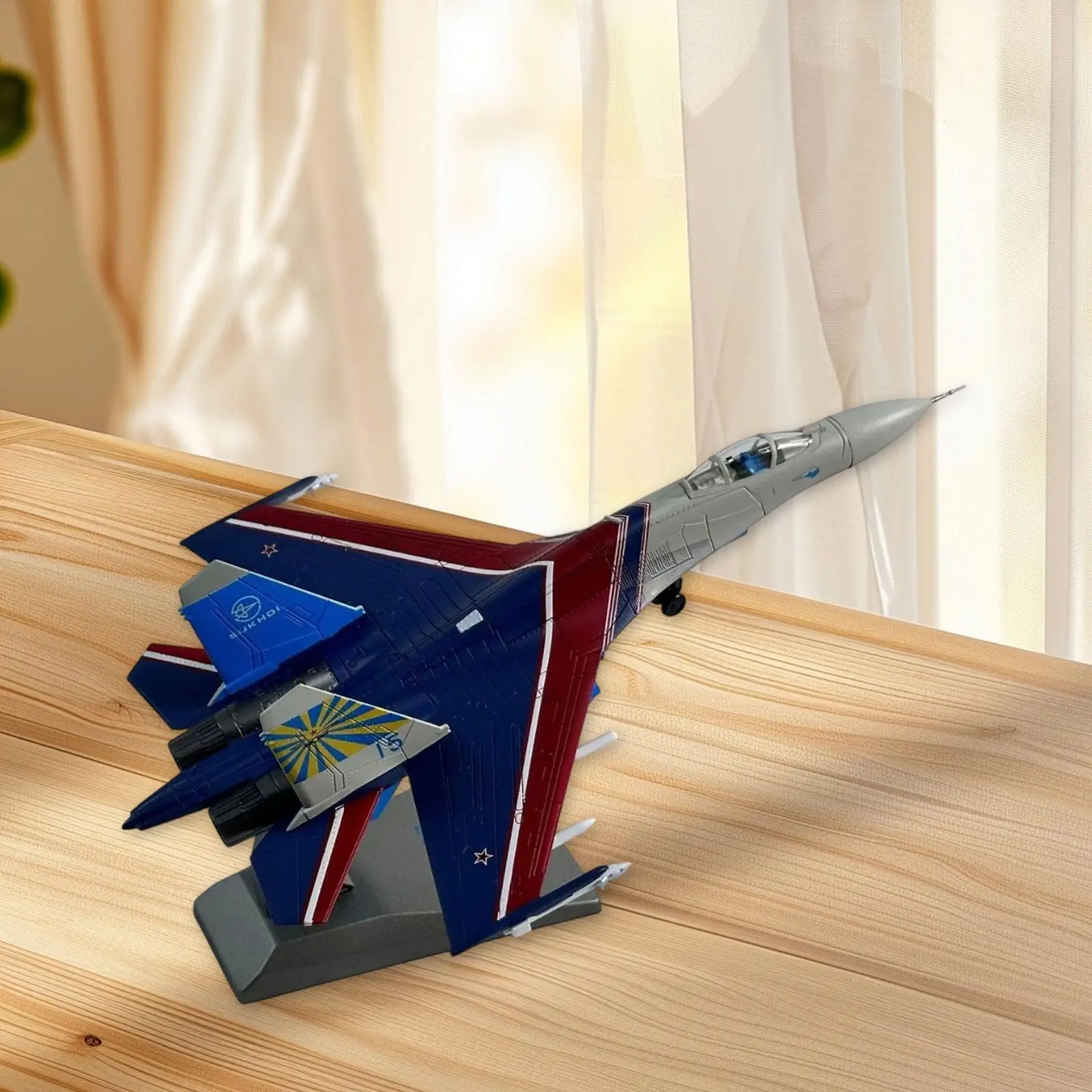 

1:100 Scale SU-27 Performance Aircraft Model Ornament Home Decoration with Stand for Bookshelf Desktop Office Living Room
