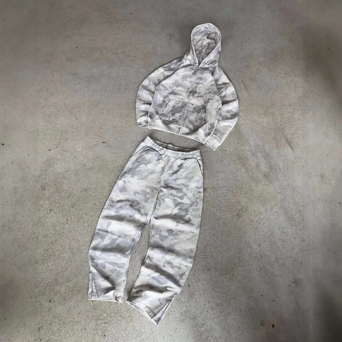 2025 hombres y mujeres high street hip-hop rap street Nueva cuerda elástica cremallera sudadera pantalones color sólido pantalones casuales