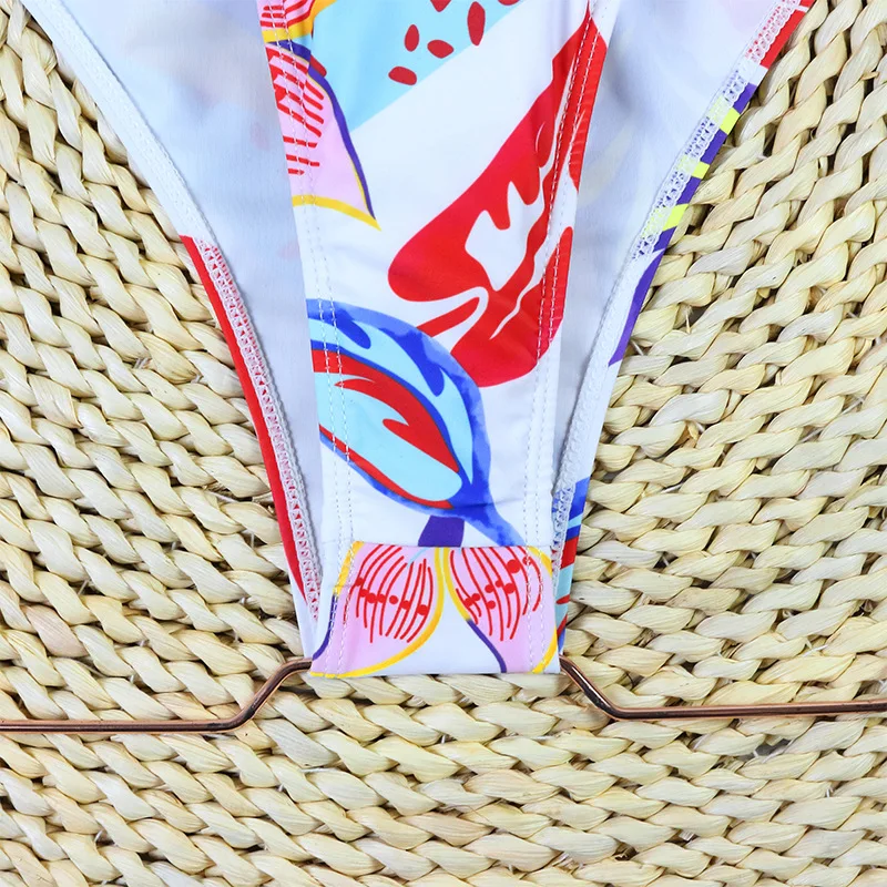 2026 مثير قطعة واحدة ملابس السباحة للنساء رفع ملابس السباحة قطع مثير بحر الإناث طويلة الأكمام ارتداءها الأزهار ثوب السباحة