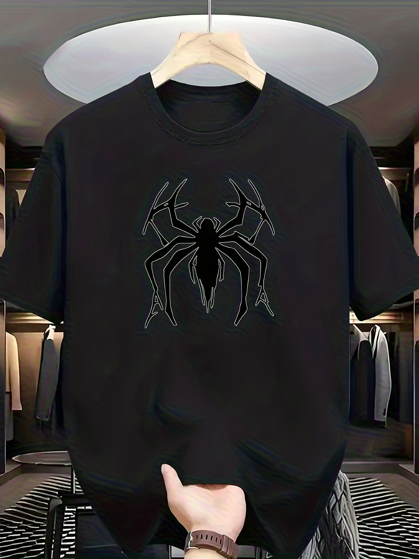 Round-neck Short-sleeve T-shirt Featuring a Black Minimalist Dark Spider Graphic on the Front. The Design Has Sharp, Mechanical Lines, Creating a Niche and Visually Striking Trendy Cool Pattern. The Style Is Dark and Rebellious, with a Strong