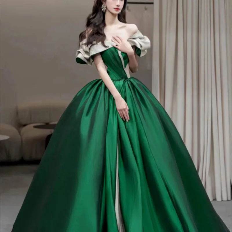 

Green satin one-line shoulder regal slimming elegant vintage performance pommel dress