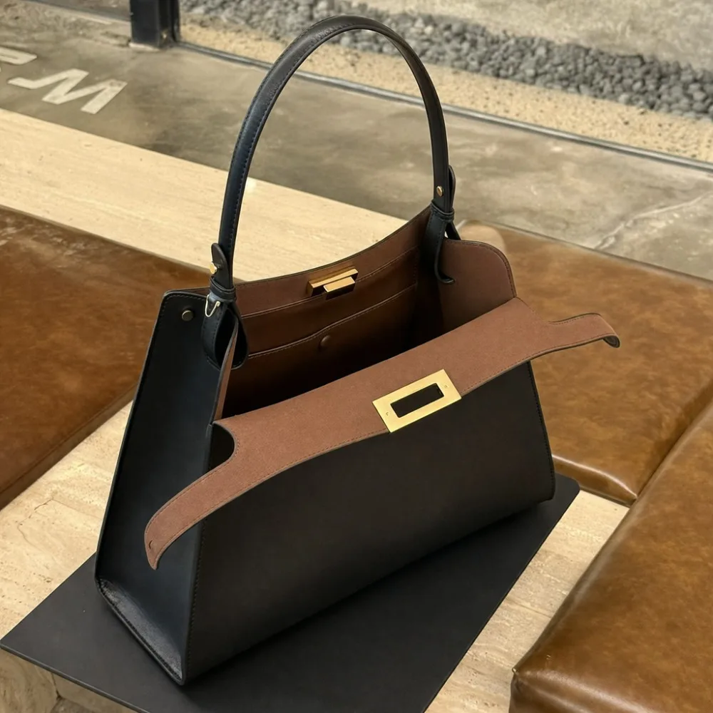 

Cowhide Shoulder 2026 New Light Luxury Metal Lock Organ Genuine Leather Women's Premium Delicate Underarm Simple Handbag