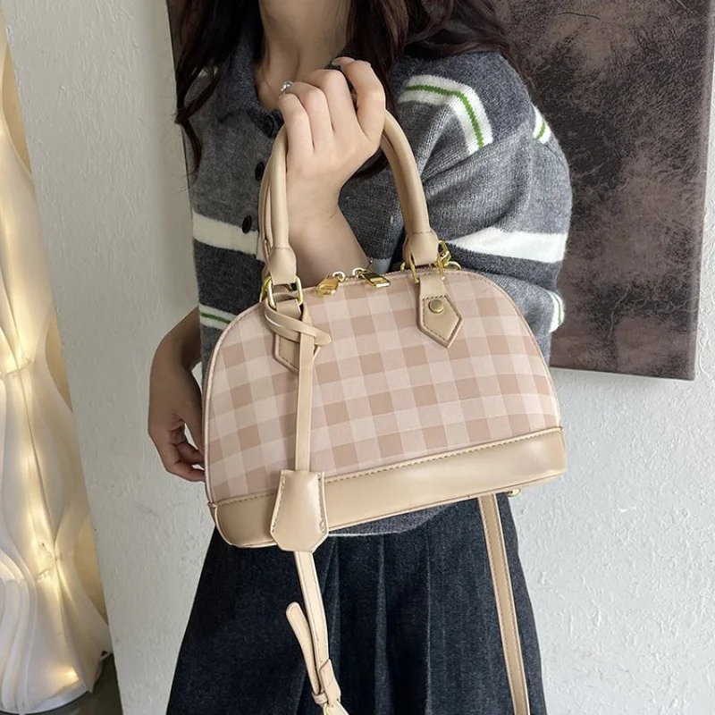 

Elegant Leather Vintage Crossbody Bag For Stylish Women With Minimalist Design And Large Capacity In Solid Color