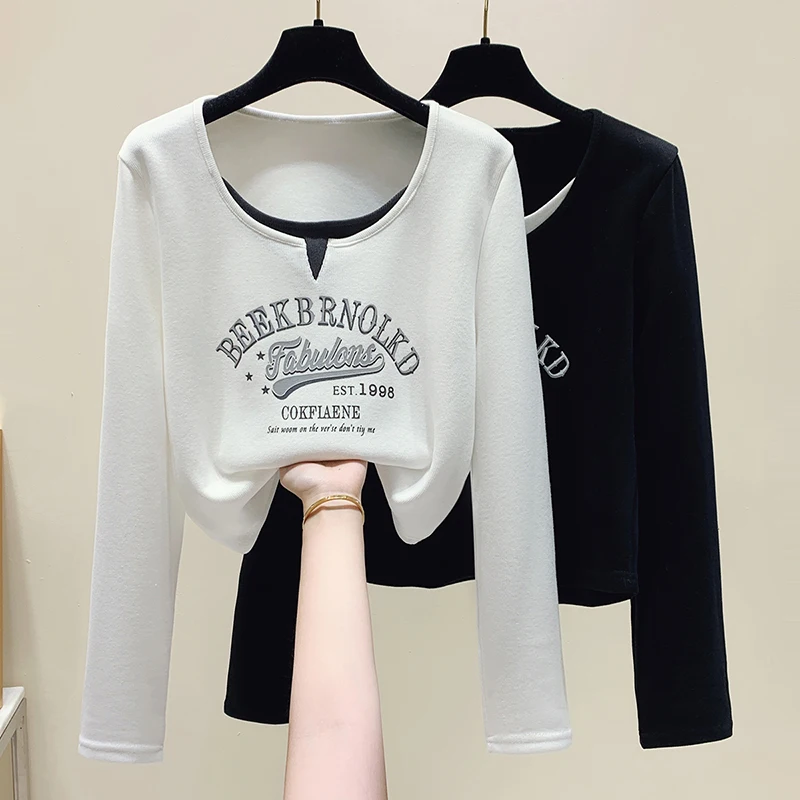 2023 new women's simple and fashionable versatile loose print stitching fake two-piece long-sleeved sweater