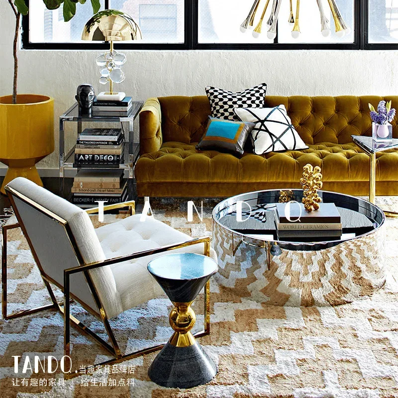 Italian light luxury stainless steel round coffee table, living room model house, villa club table round table