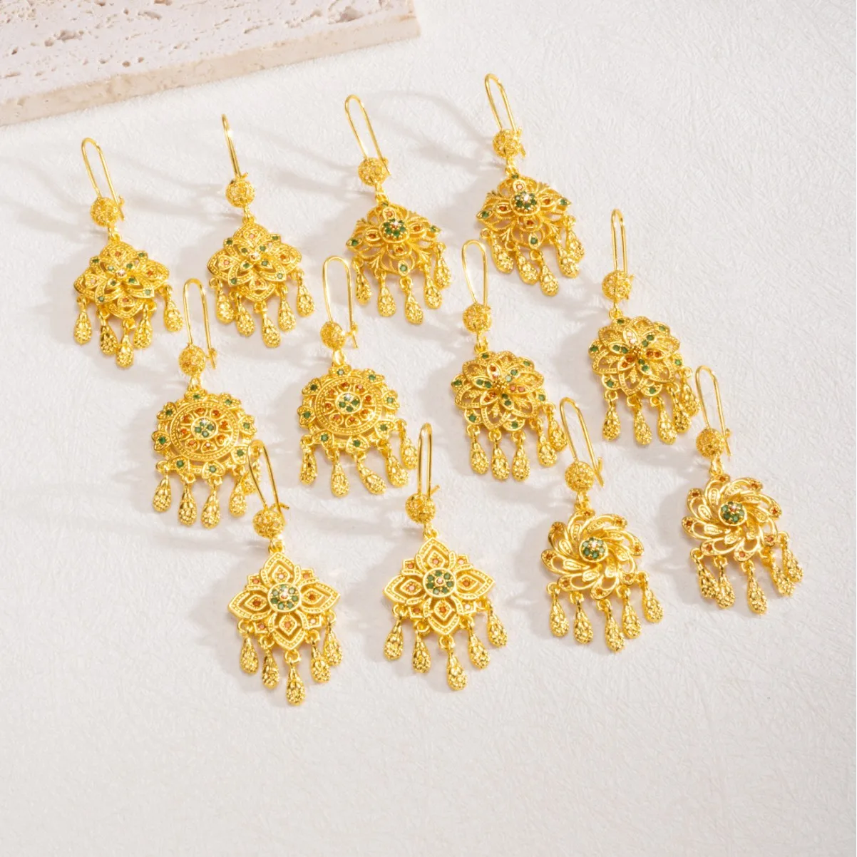 9999 gold Xinjiang ethnic style stud earrings with exotic charm, Middle East Dubai imperial fringed earrings, and West Sichuan