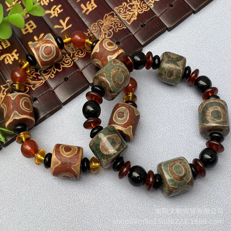 Agate bracelet with three-eyed Dzi  barrel   spacers  and round beads