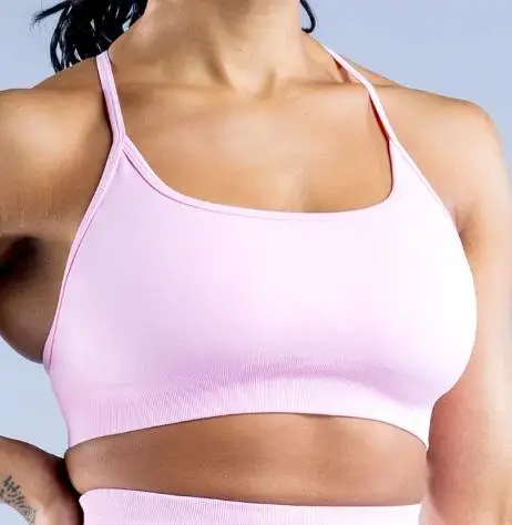 حمالة صدر رياضية ديناميكية بدون ظهر مع شعار للنساء حمالة صدر لليوجا بدون خياطة متوسطة الدعم مبطنة للصالة الرياضية توب رياضي للياقة البدنية قابل للتمدد