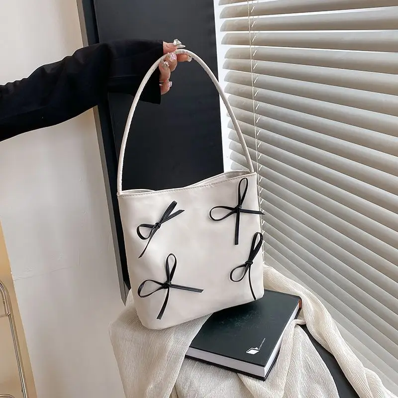 

Solid color bow Women's Large Capacity New Versatile Shoulder Bag Trendy Underarm Bag Sweet Fresh Bucket Bag New Tote Handbag