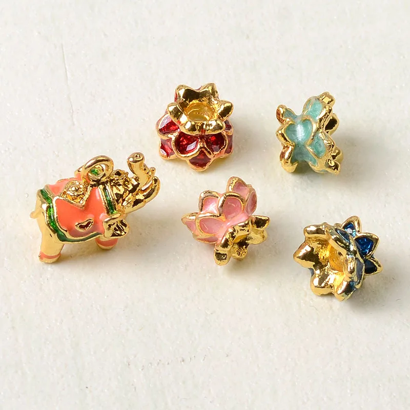 

100 pieces set DIY handmade jewelry table pendant and new 18K color baby elephant dripping oil lotus table seat