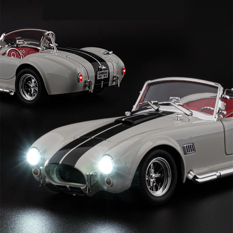 1:22 Shelby Cobra 427 S/C alliage Roadster modèle de voiture de sport en métal moulé sous pression classique rétro véhicule modèle de voiture son lumière enfant jouet cadeau