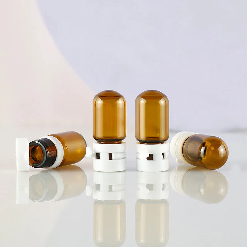 

Essential Oil Bottles 50/100pcs 2ml Empty Amber Glass Cosmetic Jar Container mini Tear cap Perfume Vials Essence Sample Bottle