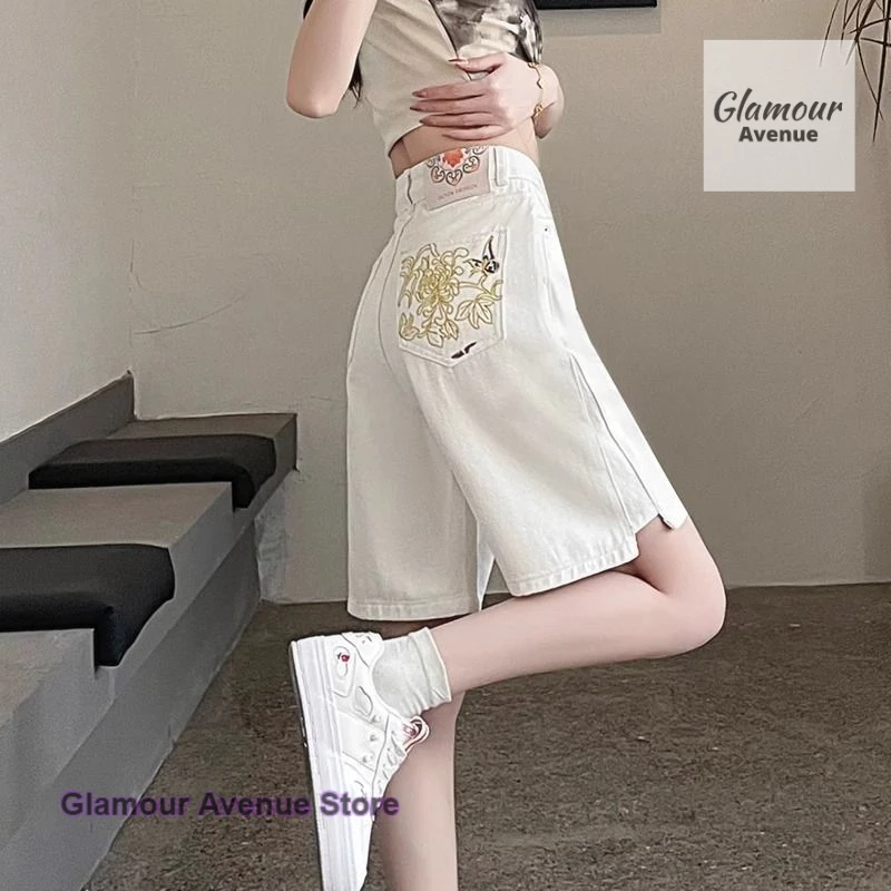 

Chinese white ethnic embroidery five-point denim shorts women's summer fashion thin split design casual loose wide-leg pants.
